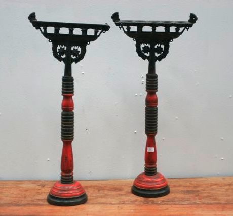 Appraisal: A pair of South Indian oil lamps with turned wooden