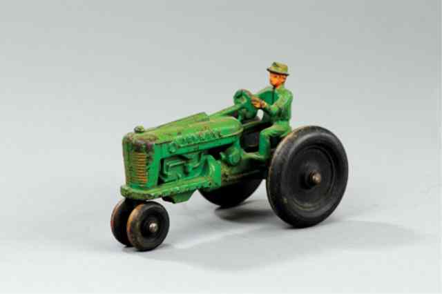 Appraisal: HUBLEY FARMALL TRACTOR Cast iron painted in green overall driver