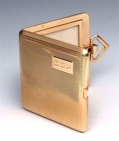 Appraisal: A CARTIER K GOLD DOUBLE PHOTOGRAPH CASE and numbered square