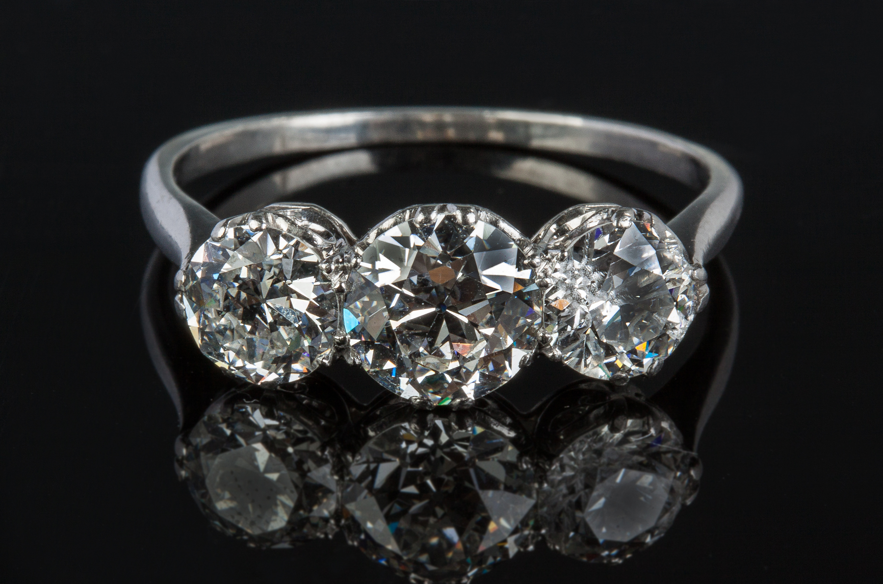 Appraisal: Ladies Platinum and Three-Diamond Vintage Ring Old European cut diamonds