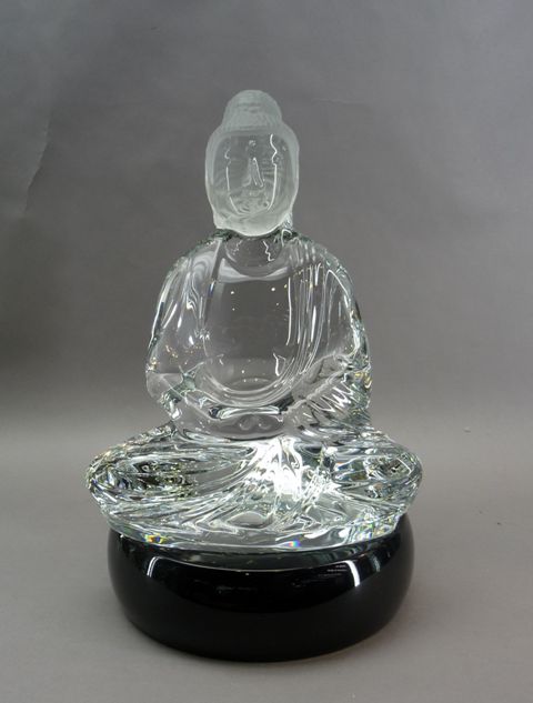 Appraisal: A crystal Buddha figurine by Baccarat set upon a lacquered