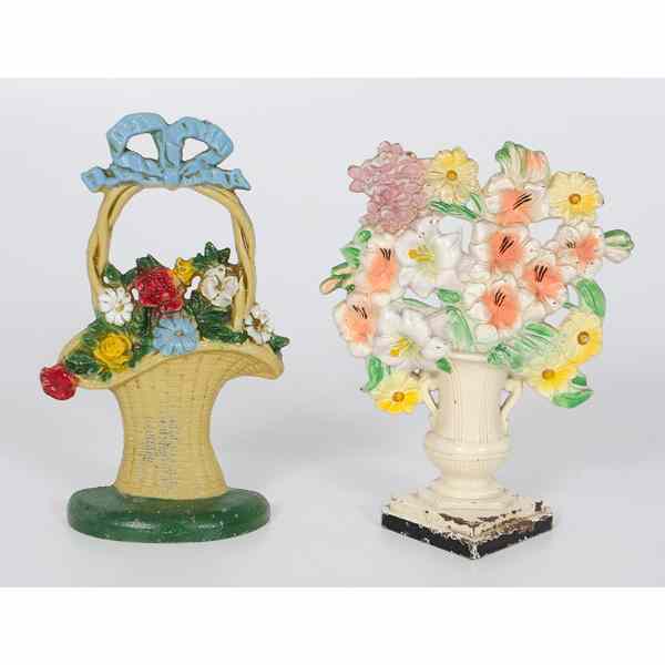 Appraisal: Cast Iron Flower Basket Doorstops American two cast iron and