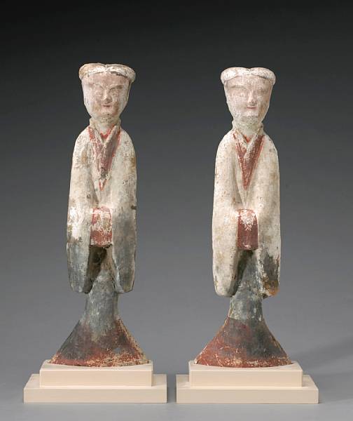 Appraisal: A pair of painted pottery tomb attendants Han Dynasty Each