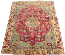 Appraisal: An Antique Heriz Rug An antique Heriz rug with a