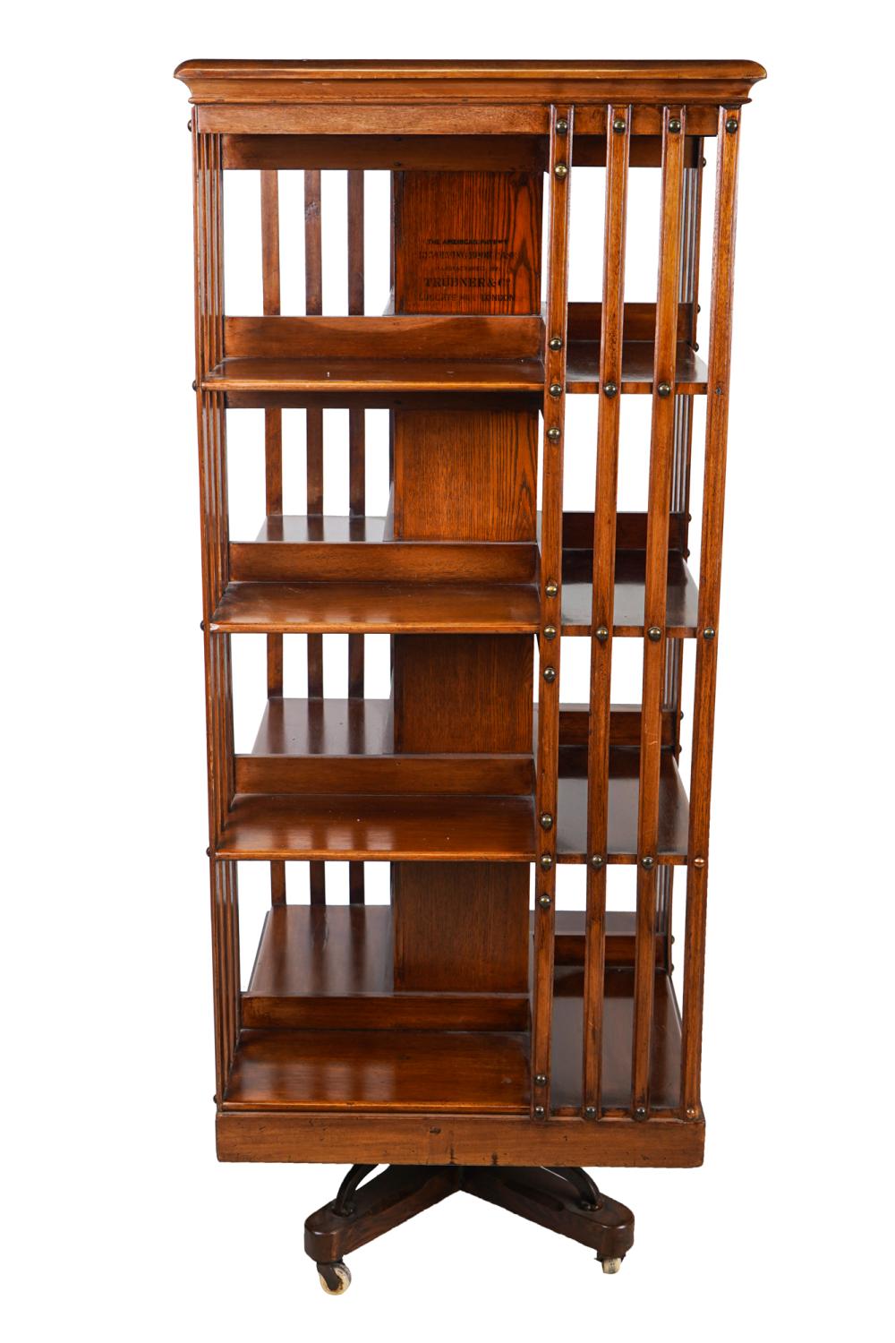 Appraisal: EDWARDIAN OAK REVOLVING BOOKCASEearly th century stamped The American Patent