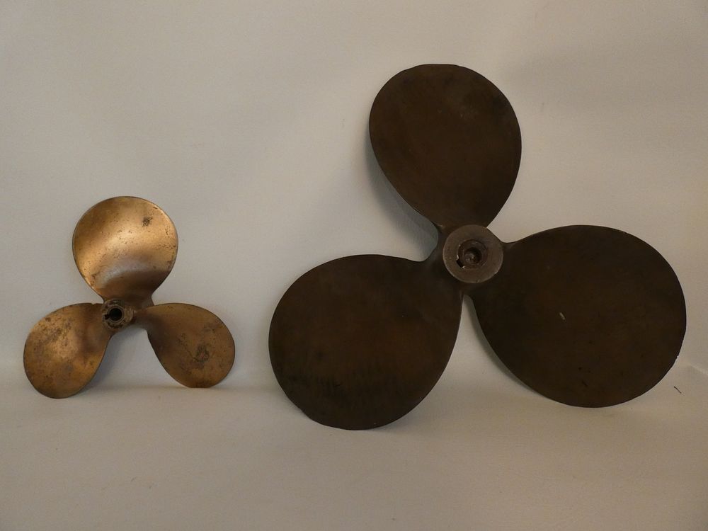 Appraisal: SHIP PROPELLERS Lot of heavy old brass ship propellers and