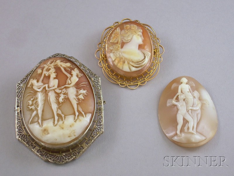 Appraisal: Three Shell-carved Cameos two framed in kt yellow and white