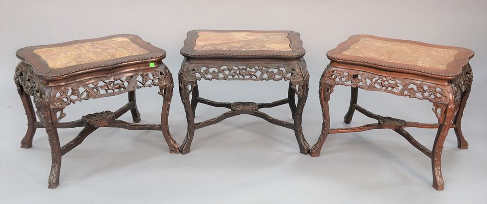 Appraisal: Three Chinese low tables carved apron with marble insert tops