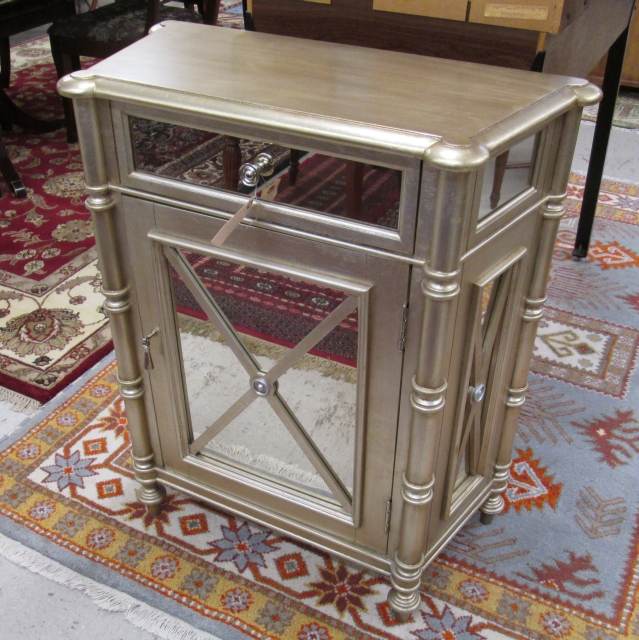 Appraisal: GILDED WOOD CONSOLE CABINET Pulaski Furniture Co featuring a mirror