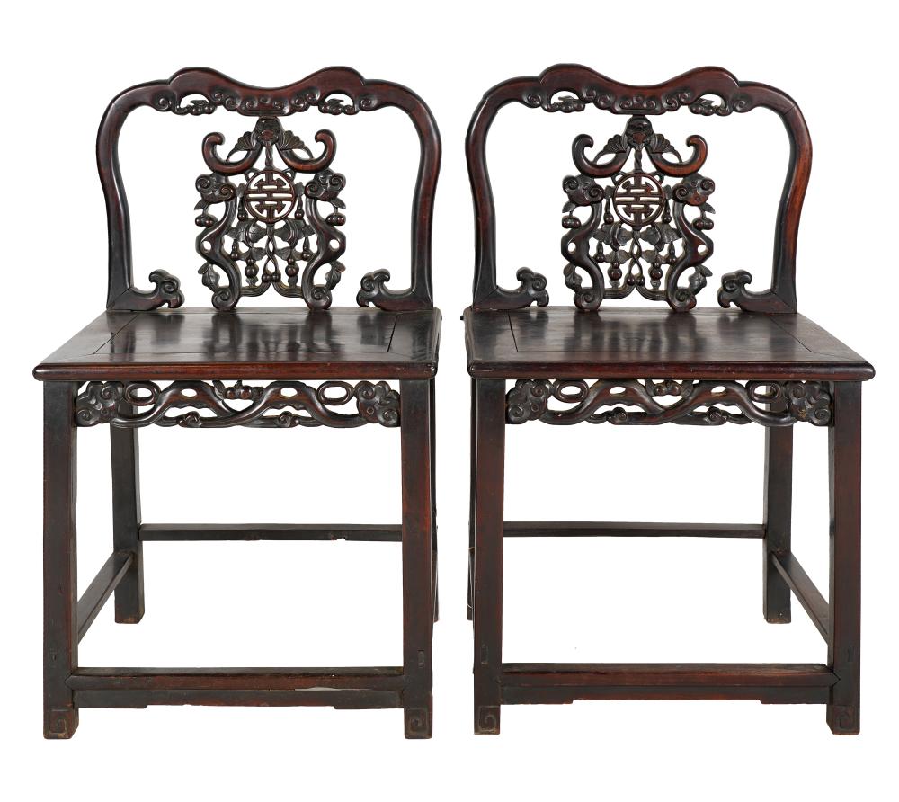 Appraisal: PAIR OF CHINESE CARVED WOOD SIDE CHAIRSeach with pierced fretwork