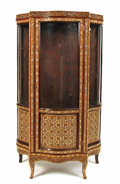 Appraisal: A Moorish style mother of pearl and tortoiseshell inlaid vitrine