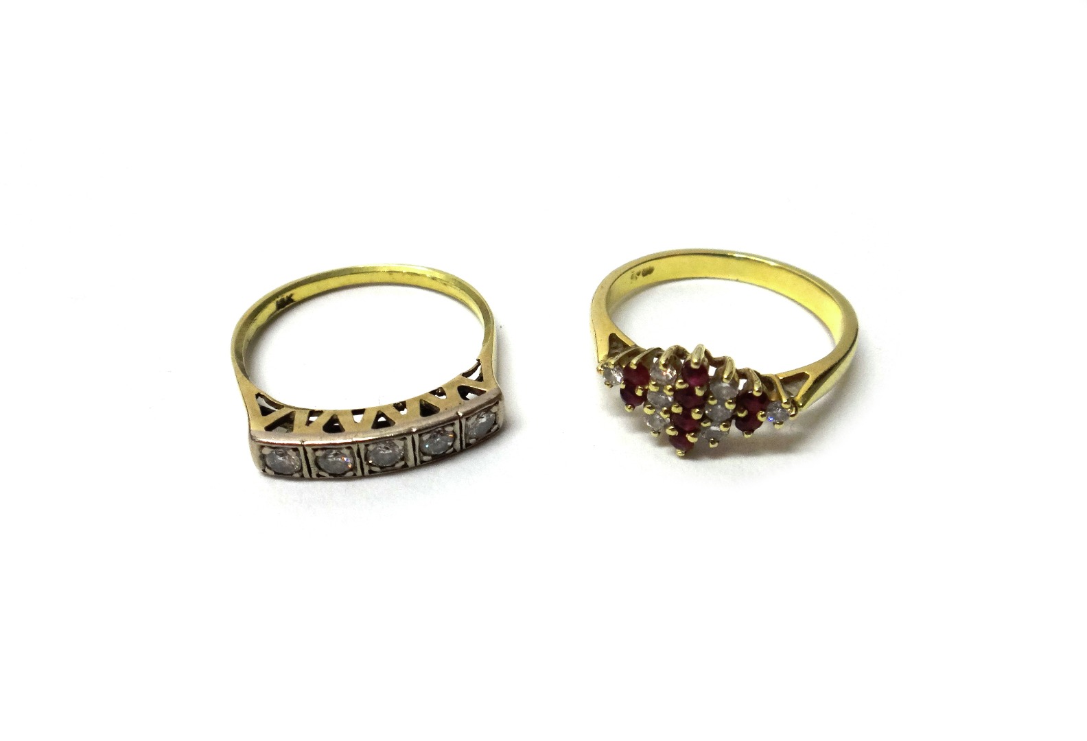 Appraisal: A gold and diamond set five stone ring mounted with