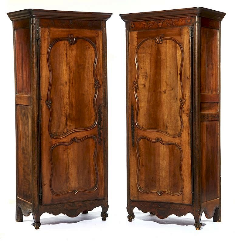 Appraisal: Pair of French walnut bonnetieres th th c Pair of