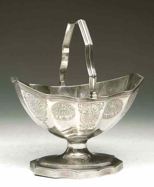 Appraisal: A GEORGE III SILVER SUGAR BASIN oval shaped with fluted