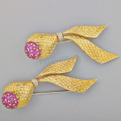 Appraisal: PAIR OF RUBY AND K GOLD BROOCHES Bombe clusters of