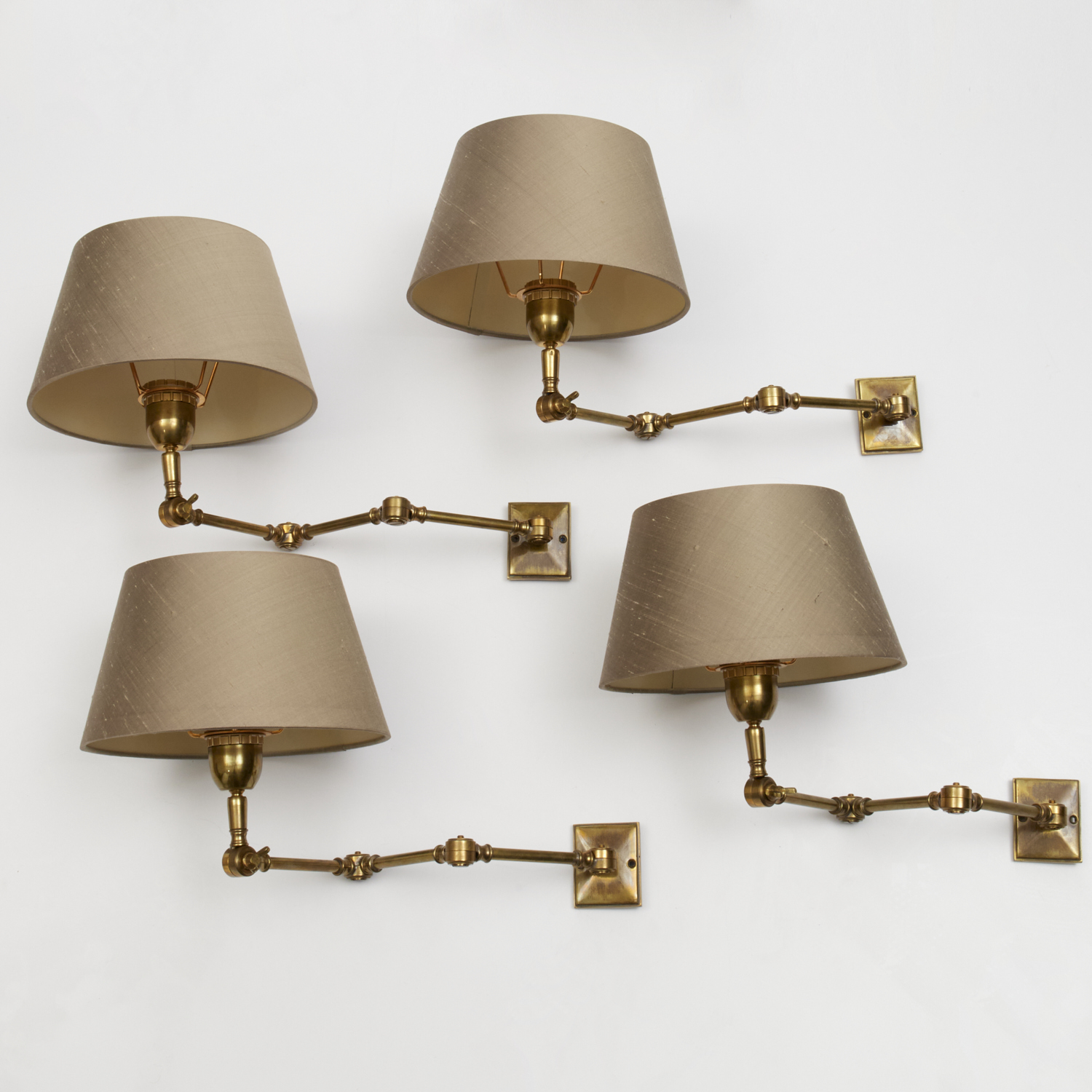 Appraisal: GALERIE DES LAMPES ARTICULATED WALL SCONCES th c brass -jointed