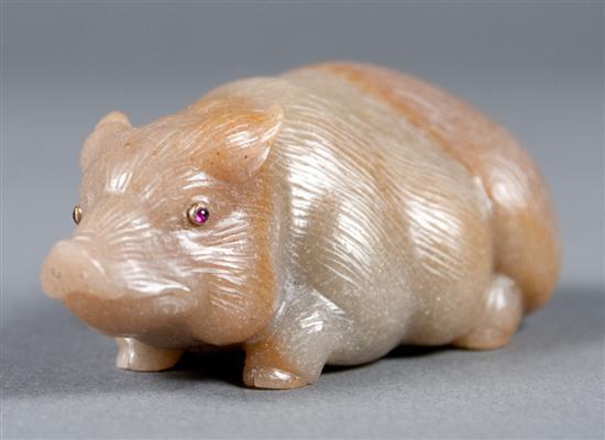 Appraisal: Carved hardstone pig with ruby encrusted eyes in fitted box