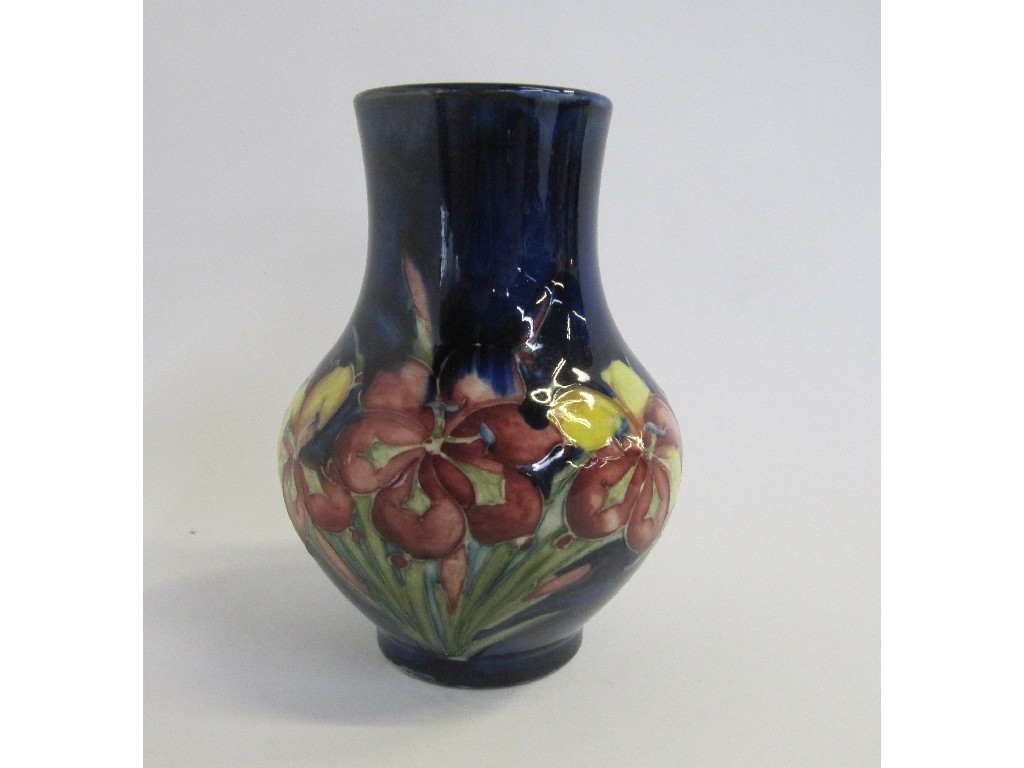 Appraisal: Moorcroft freesia vase on blue ground