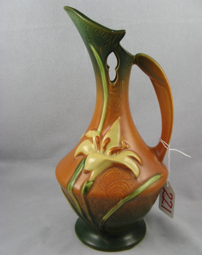 Appraisal: ROSEVILLE POTTERY EWER in the Zephyr Lily pattern bulbous form