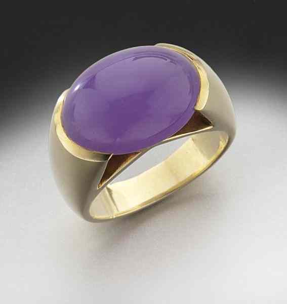 Appraisal: K gold and natural lavender jadeite ringfeaturing an oval lavender