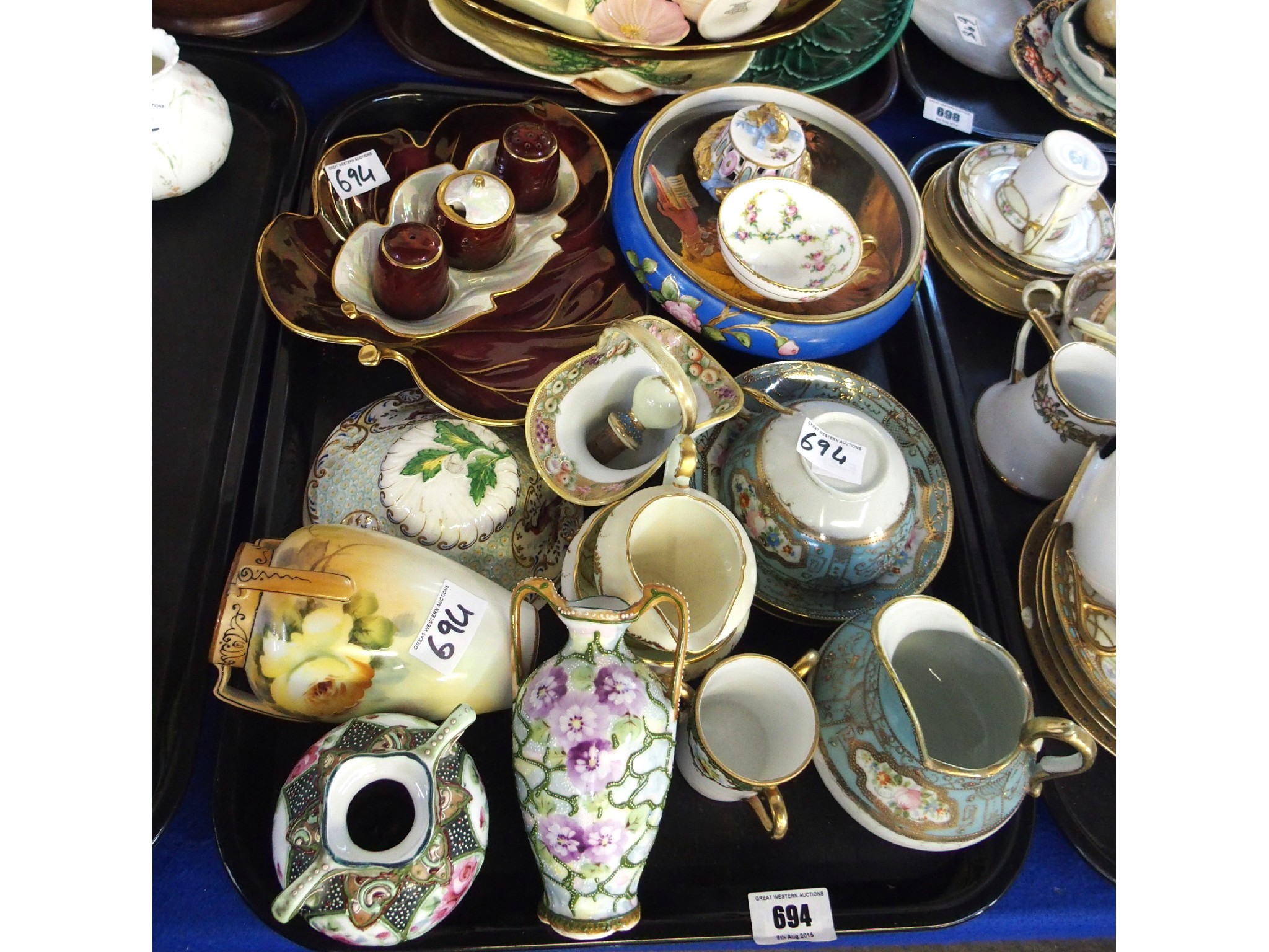 Appraisal: Tray comprising enamelled porcelain bud vases creamer teacup with two