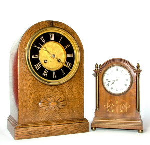 Appraisal: An Edwardian mantel clock the mahogany case with arched top