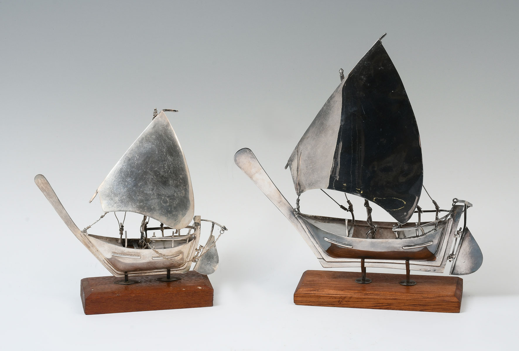 Appraisal: STERLING SILVER SAILBOATS ON STANDS Approx Troy ounces artisan hand