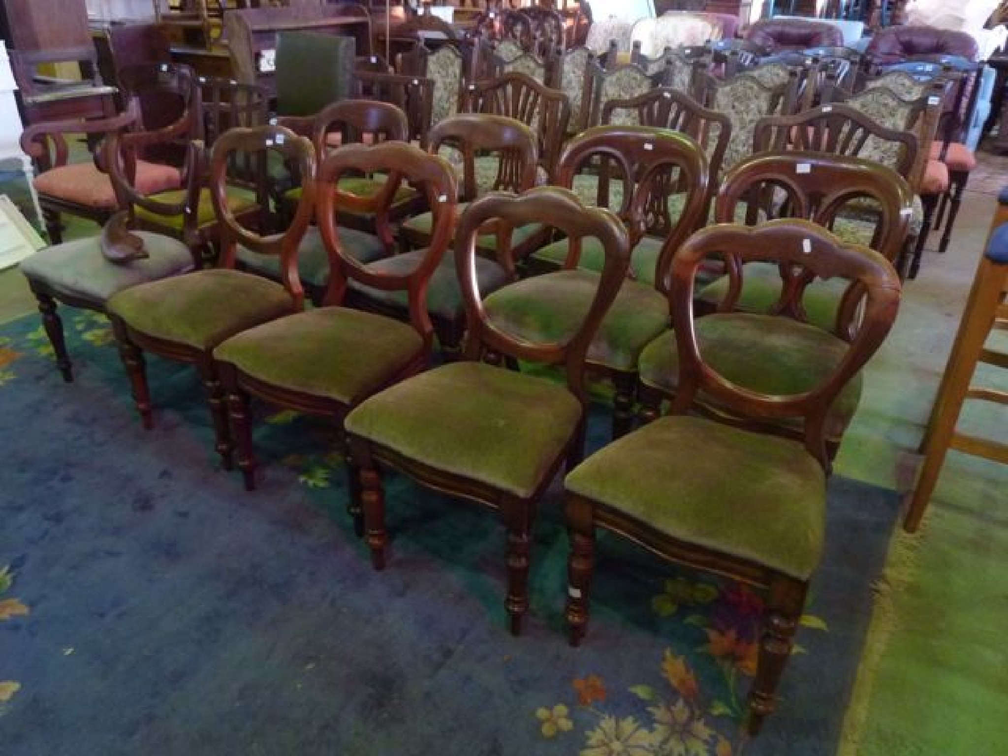 Appraisal: Nine Victorian balloonback dining chairs of three varying designs all