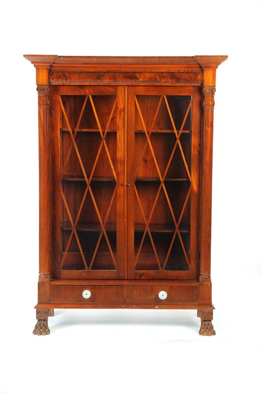 Appraisal: EMPIRE-STYLE BOOKCASE American early th century Mahogany and flame veneer