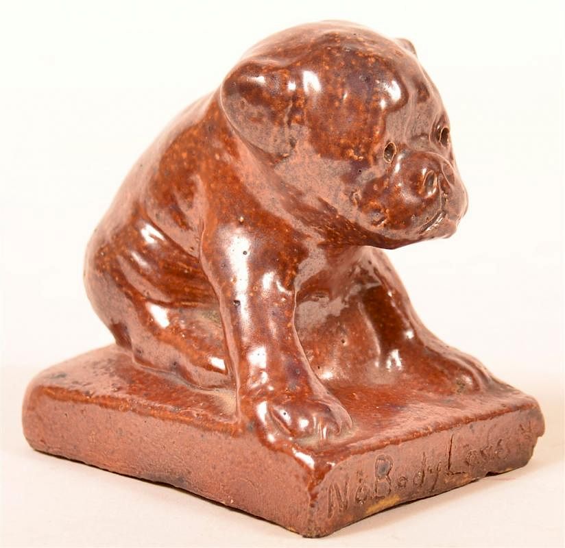 Appraisal: Ohio Sewer Tile Puppy Paperweight Ohio Sewer Tile Puppy Paperweight