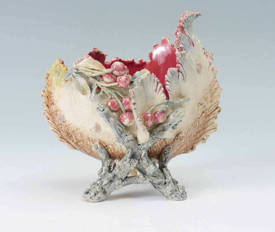 Appraisal: MAJOLICA CENTER BOWL Cherries on an asymmetrical bowl supported by