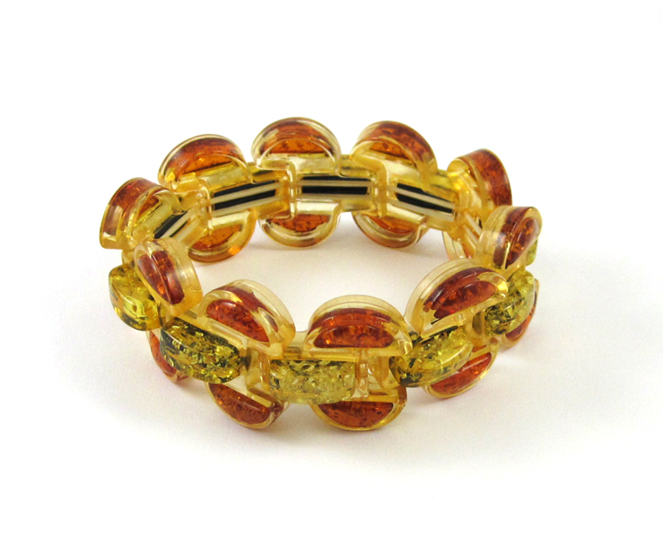 Appraisal: PRESSED AMBER STRETCH CHUNKY BRACELET with ten multi-color pressed amber