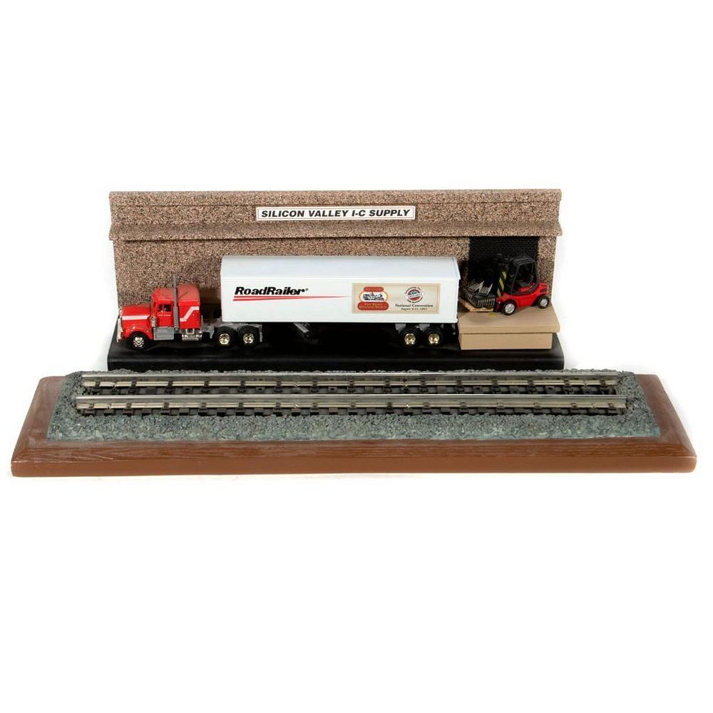 Appraisal: Store Display with Lionel Truck O Gauge display track Silicon