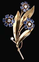 Appraisal: SAPPHIRE DIAMOND BROOCH Beautiful floral spray brooch has leaves and