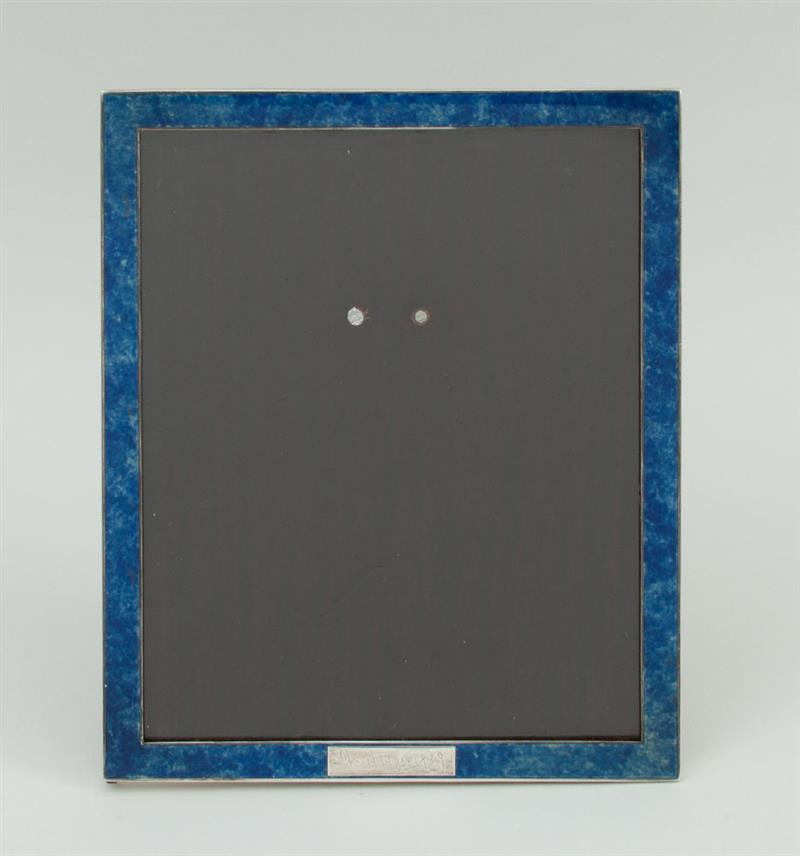 Appraisal: CARTIER LAPIS LAZULI ENAMEL-MOUNTED SILVER PICTURE FRAME With inscription 'Christmas