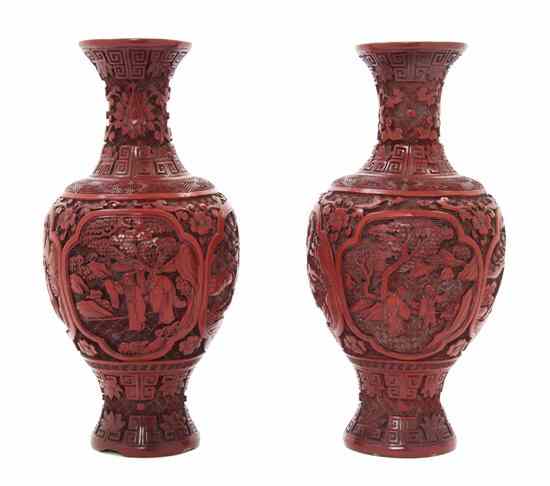 Appraisal: A Pair of Chinese Cinnabar Baluster Vases each decorated with