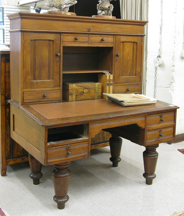 Appraisal: VICTORIAN WALNUT SLOPING-TOP LIBRARY DESK American c - in two