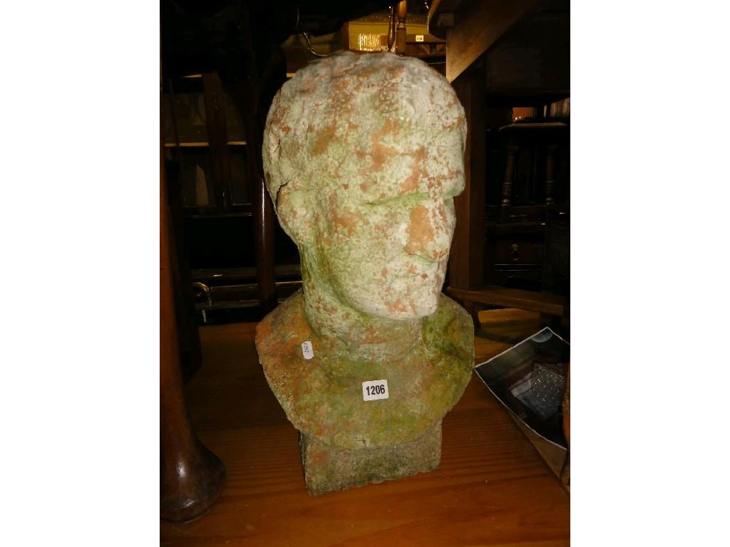 Appraisal: A terracotta bust of a man with decorative weathered finish