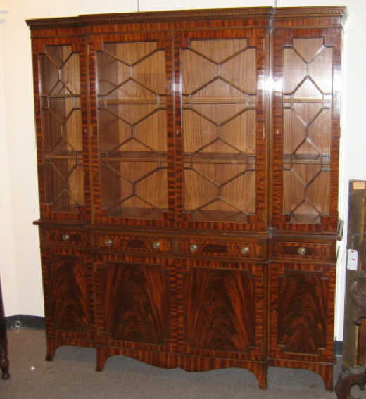 Appraisal: ENGLISH MAHOGANY BREAKFRONT By E G Hudson with dentil molded