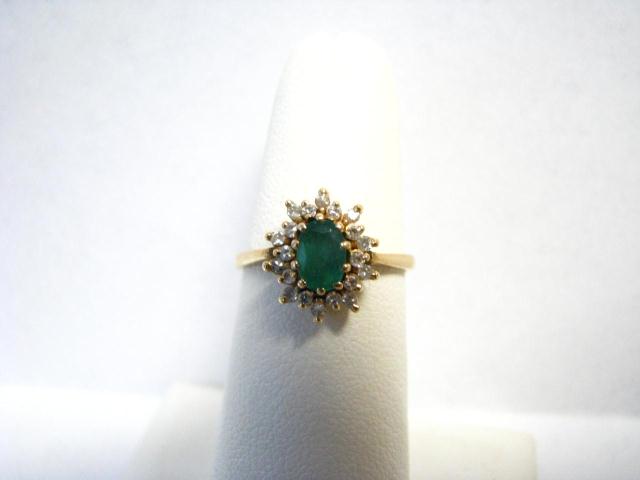 Appraisal: Lady's K yellow gold ring with approximately ct oval emerald