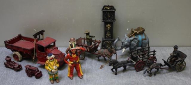 Appraisal: Lot of Cast Iron Toys and Banks Some including Mack