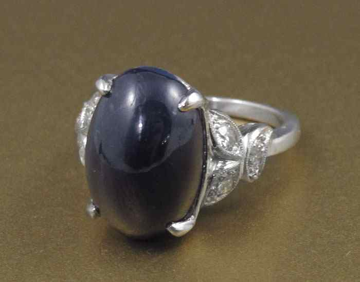 Appraisal: A STUNNING ART DECO PLATINUM CT CABOCHON SAPPHIRE AND DIAMOND