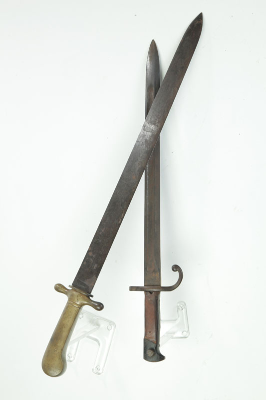 Appraisal: BAYONET AND A SWORD Includes a marked Remington export bayonet