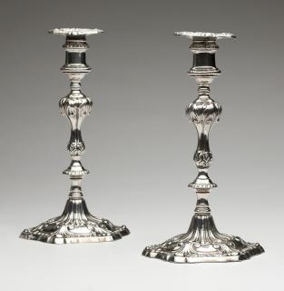 Appraisal: A pair of George III sterling silver candlesticks London each