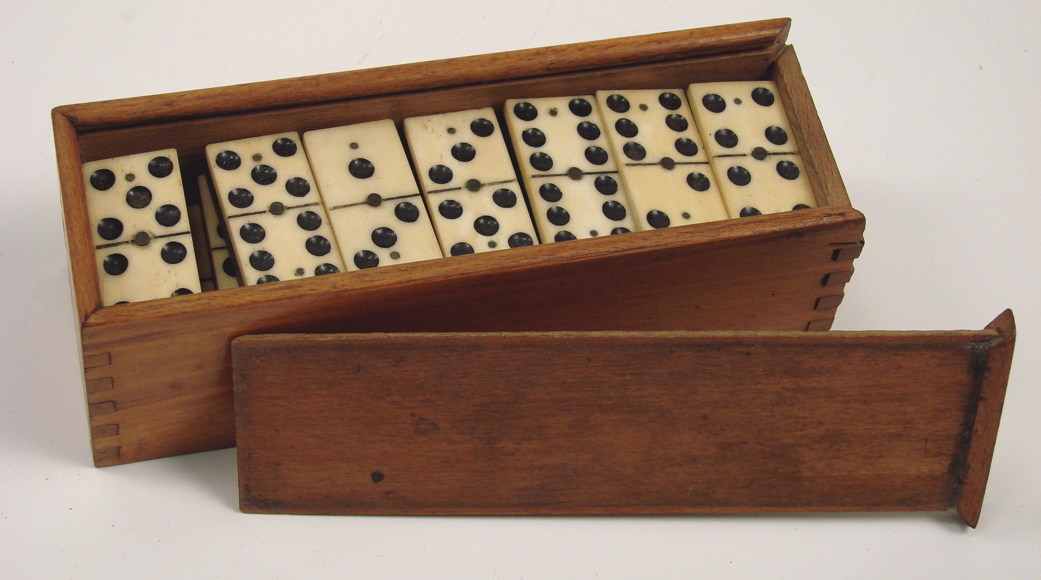 Appraisal: CASED SET OF BONE AND EBONY DOMINOES th CenturyFull double-six