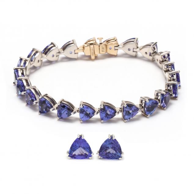 Appraisal: TANZANITE BRACELET AND EARRINGS The line bracelet set with trillion