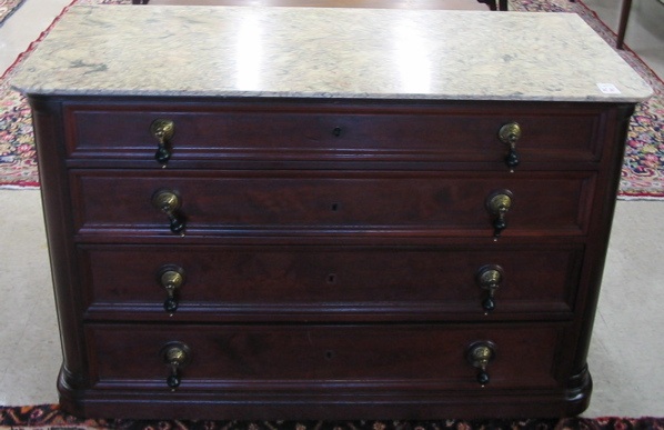 Appraisal: A VICTORIAN WALNUT CHEST OF DRAWERS American th century having