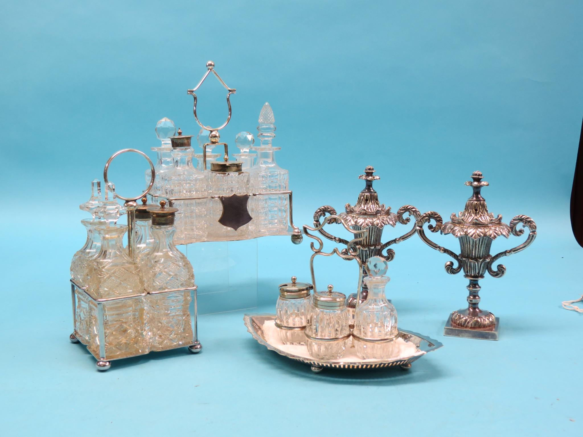 Appraisal: Three glass cruet sets each on plated stand and a