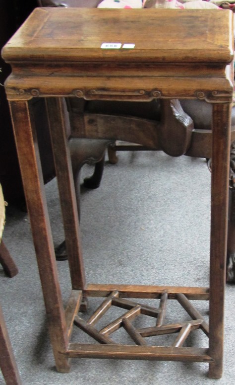 Appraisal: A pair of late th century Chinese hardwood urn stands