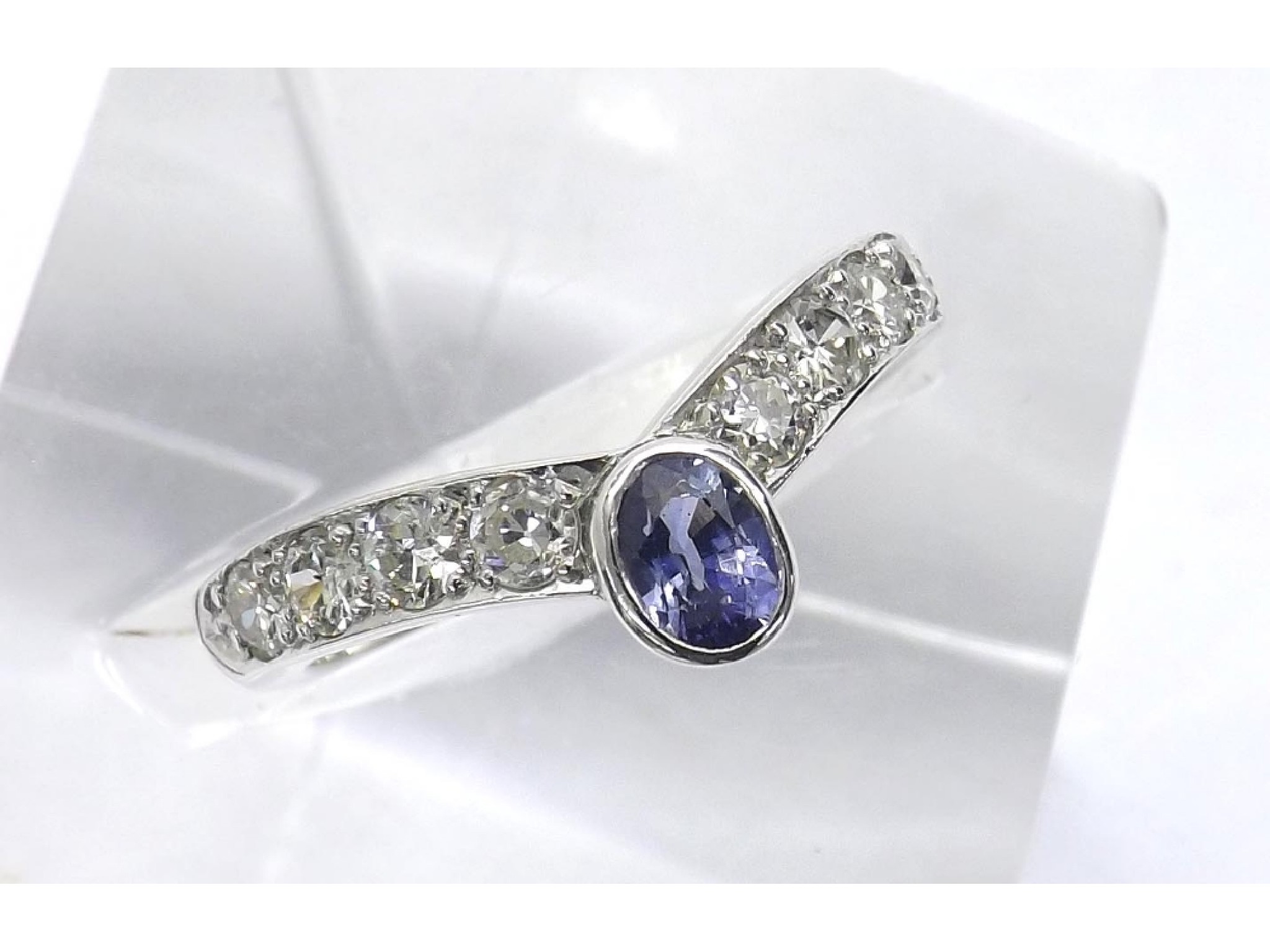 Appraisal: - -a Platinum diamond and tanzanite wishbone shaped ring gm